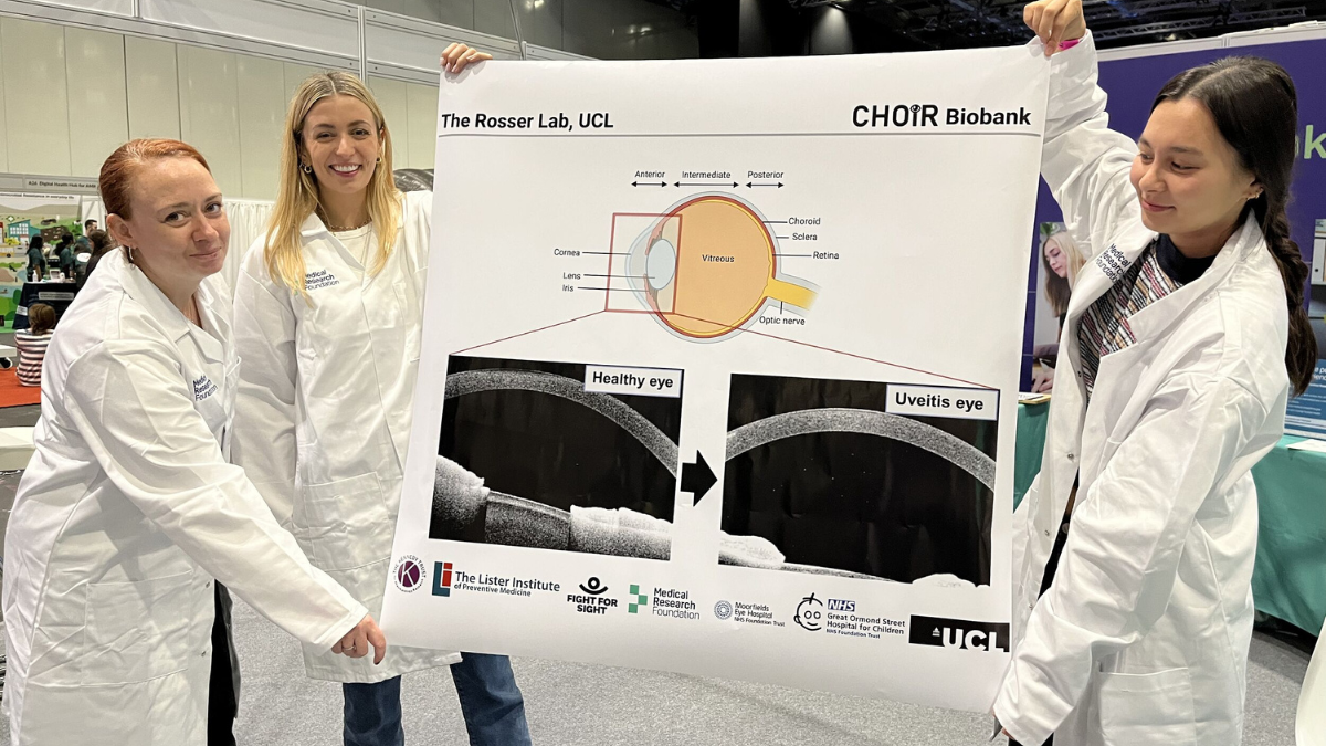 Dr Elizabeth Rosser and colleagues displaying a poster on their research at New Scientist Live.